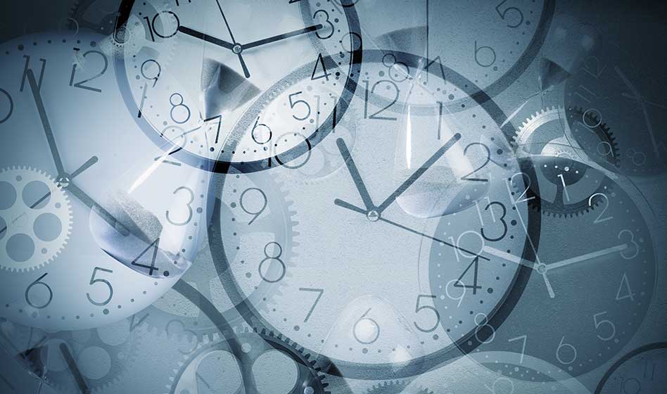 kelloja harmaalla tausatlla