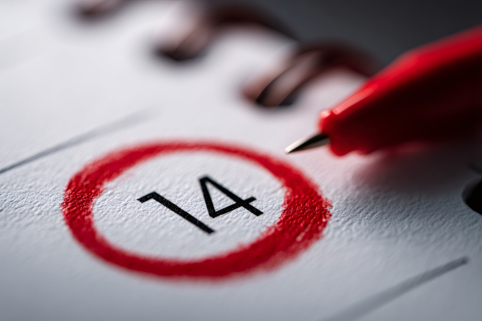 Punainen ympyrä jonka keskellä numero 14